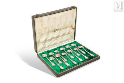 silverware set in a case with green velvet lining