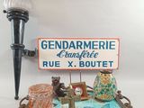 a sign that says gendarmerie and a bear on a boat