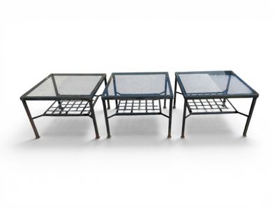 three tables with glass tops on a white background