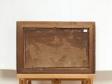 a picture of a wooden easel with a painting on it