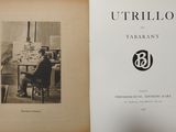 an old book with a picture of a man sitting at a table