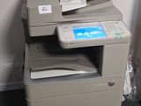 a printer that is sitting on top of a desk