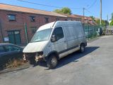 a van that is parked on the side of the road