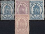 four different stamps of different colors and designs on a black surface