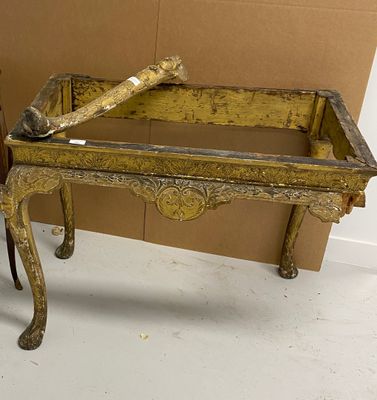 two tables that are sitting next to each other in a room