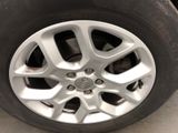 the tire of a car is shown with a flat tire