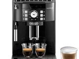 a black coffee machine with two cups of coffee next to it