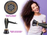 a woman that is blow drying her hair with a blow dryer