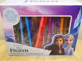 a box of disney frozen candles sitting on a table