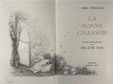 an open book with a drawing of a tree in the background