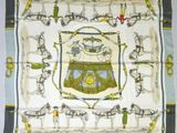 an image of a square scarf with horses and carriages on it