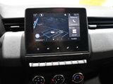 the dashboard of a car with a tablet on the dashboard