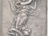 a close up of a silver medal with an angel on it