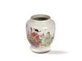 a white vase with a painting on it on a white surface