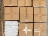 boxes stacked on top of each other in a warehouse area