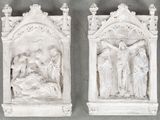 pair of white plaster wall plaques depicting the crucifix of jesus and mary