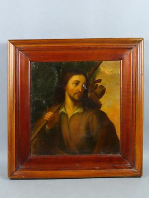 an oil painting of a man holding a bird in a wooden frame