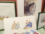 un tableau représentant une femme assise sur une table, à côté d'une assiette de nourriture