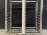 a metal rack with a bunch of trays on top of it