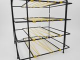 a close up of a three tiered rack with yellow ropes