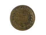 a close up of a coin on a white background