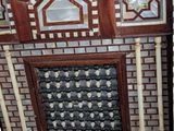 a picture of a decorative fireplace in the middle of a room