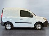 a picture of a white van parked in a room