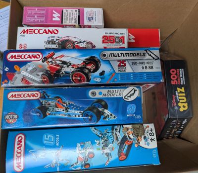 boxes of assorted legos are stacked on top of each other