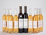 six bouteilles de vin sont alignées sur une table