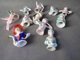 a lot of figurines that are sitting on a table