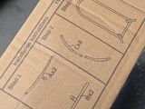 a cardboard box that has a drawing of a basketball court on it