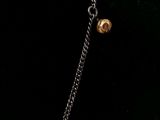 a close up of a necklace on a mannequin mannequin mannequin mannequin mannequin mannequin mannequin mannequin