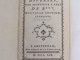 an open book with a picture of the title of a poem