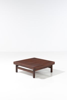 an image of a small square coffee table with a wooden top
