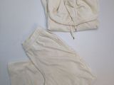 two pieces of clothing are laid out on a white surface