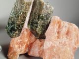 a close up of a rock with some rocks in the background