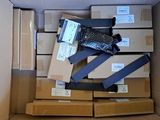 a cardboard box filled with many different types of electronic devices