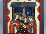 un tableau représentant une crèche avec trois anges et une étoile