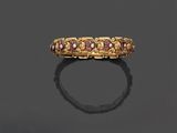 une bague en or et rubis