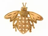 an image of a gold bee brooch with diamonds on it ' s wings