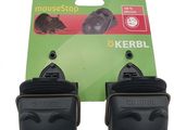 two black mouse stoppers on a white background with a green package