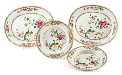 four pieces of chinese porcelain dishes with floral designs on them