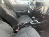 a picture of a car interior with a steering control