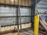 an image of a warehouse with a lot of equipment in it