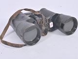 a pair of binoculars that are sitting on the ground