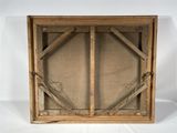 an old wooden picture frame with two open doors on a white background