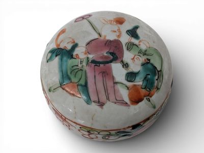 a white box with a painting on it on a white surface
