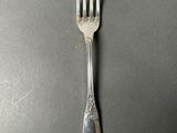 a fork that is sitting on a table