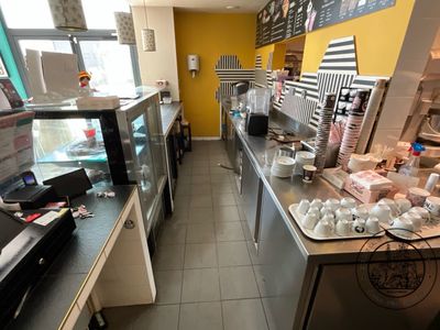 an image of a restaurant with a counter and a counter top