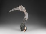 an image of a sculpture of a bird with a long beak